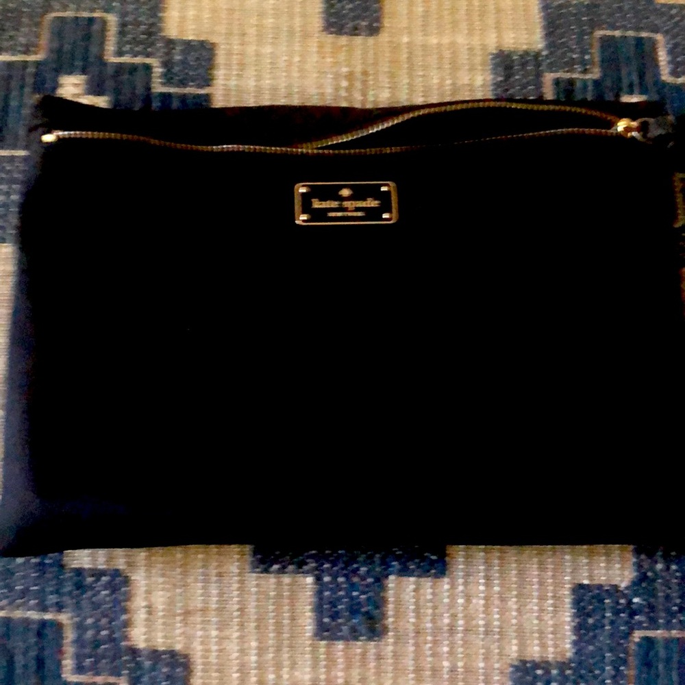 Kate spade make up or pencil case.